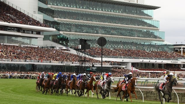 The field rounds the bend in last year's Melbourne Cup at Flemington Racecourse