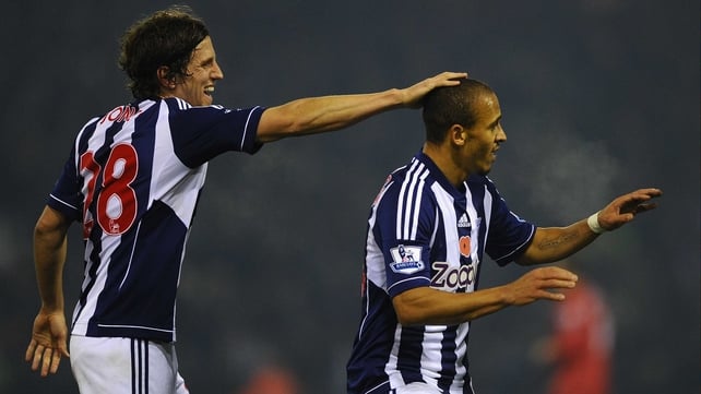 Billy Jones (L) and Peter Odemwingie celebrate WBA's opener