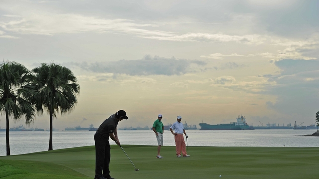 Rory McIlroy putts during the pro-am prior to the start of the Barclays Singapore Open at the Sentosa Golf Club