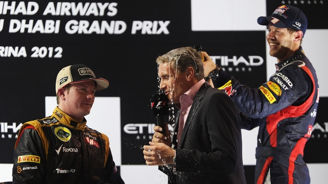 Sebastian Vettel pours champagne on David Coulthard as he tries to interview Kimi Raikkonen last week