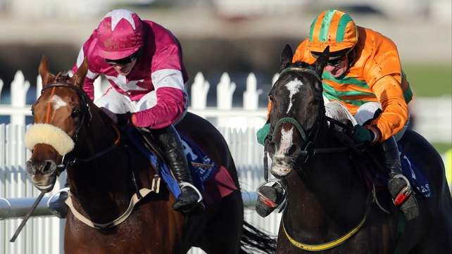 The well-backed Texas Jack (r) and Paul Carberry beat Make A Track and Davy Russell a touch cosily in the beginners' chase
