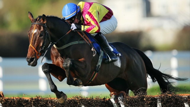 Patrick Kennedy rides Eugene O'Sullivan's A Decent Excuse to a wide-margin victory in the three-mile maiden hurdle