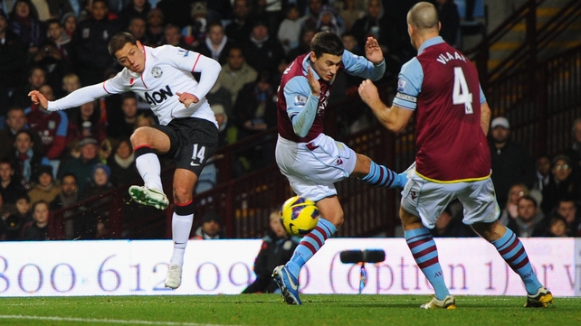 Javier Hernandez cannons the ball off Vlaar, helping the defender score an own goal