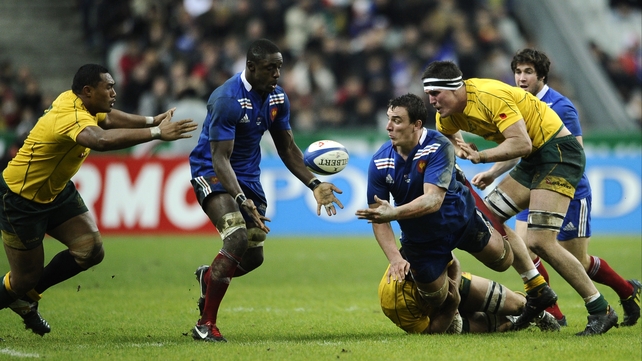 France's Louis Picamoles passes the ball to flanker Yannick Nyanga