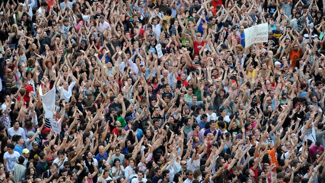 Thousands protest in Spain over the high level of unemployment and austerity Thousands protest in Spain over the high level of unemployment and austerity