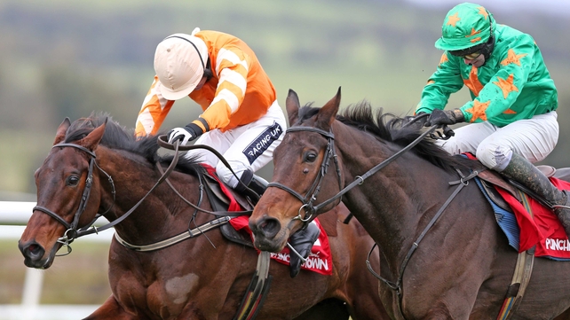 Twinlight and Ruby Walsh outbattle Baily Green and David Casey in the closing stages of the Craddockstown Novices' Chase at Punchestown