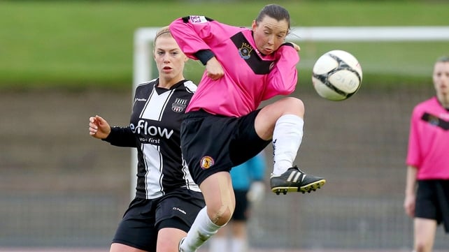 Clare Conlon of Wexford Youths gets to the ball ahead of Mary Waldron