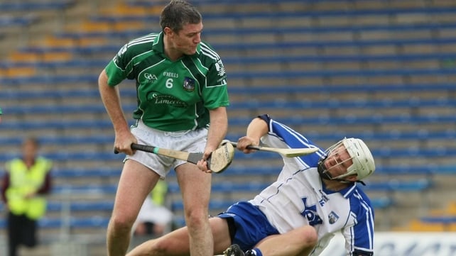 Geary in action against Waterford's Stephen Molumphy in the 2009 Munster semi-final