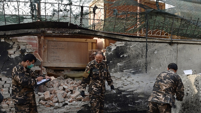 Two Afghan guards were killed in the attack, which was claimed by the Taliban Two Afghan guards were killed in the attack, which was claimed by the Taliban