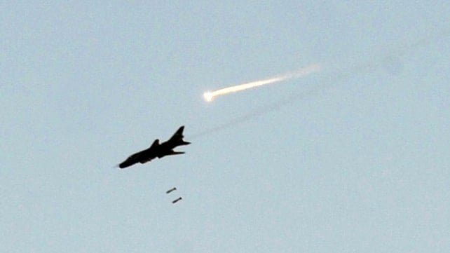 Syrian fighter jets hit the suburb of Daraya Syrian fighter jets hit the suburb of Daraya