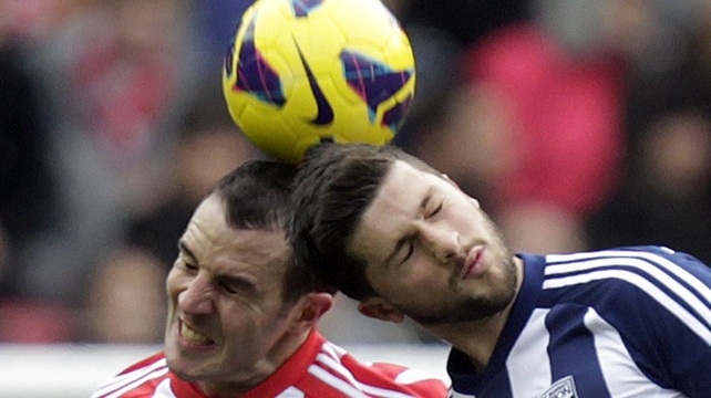 John O'Shea and Shane Long clashed early on