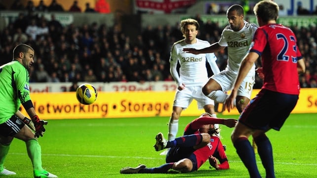 Wayne Routledge scores the second Swansea goal