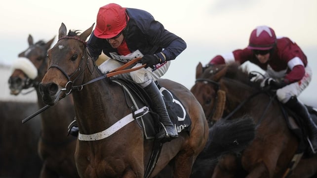 Bobs Worth and Barry Geraghty lead over the last, en route to victory in Saturday's Hennessy Gold Cup at Newbury
