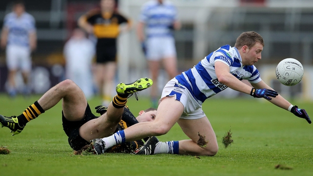 Dr Crokes' Michael Moloney and Brian Hurley of Castlehaven contest the ball