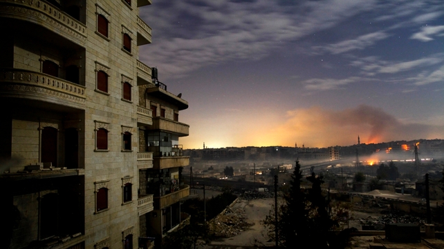 Smoke rises in the northern city of Aleppo on 1 December, as fighting continues through the night Smoke rises in the northern city of Aleppo on 1 December, as fighting continues through the night