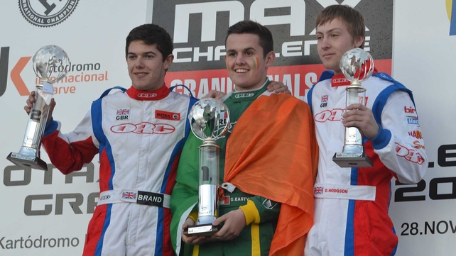 Charlie Eastwood on the podium with Edward Brand left (L) and Oliver Hodgson (R)
