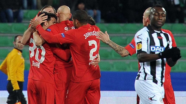 Liverpool player mob Jordan Henderson following his first European goal
