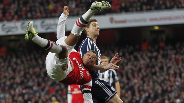 Arsenal striker Alex Oxlade-Chamberlain tries the spectacular against West Brom