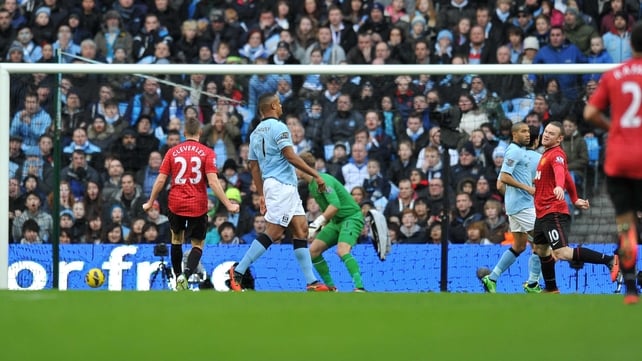 Harte can only look on as Rooney opens the scoring in United's 3-2 win over their city rivalss