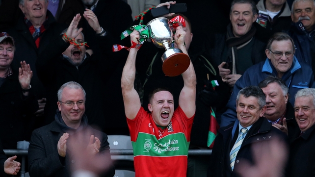 Davy Byrne lifts the winning trophy for the north Dublin side