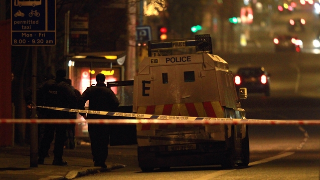 Police patrol the area in Belfast where a police officer was attacked with a petrol bomb Police patrol the area in Belfast where a police officer was attacked with a petrol bomb