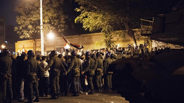 Egyptian soldiers cordon off an area in Cairo as opposition supporters hold a rally Egyptian soldiers cordon off an area in Cairo as opposition supporters hold a rally