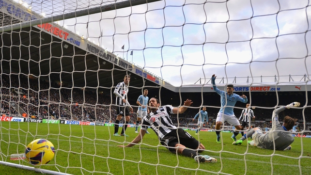 Kolarov celebrates as Toure's strike seals the points for City