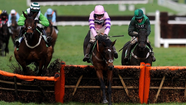 Ruby Walsh riding Zarkandar clear the last to win the StanJames.com International Hurdle
