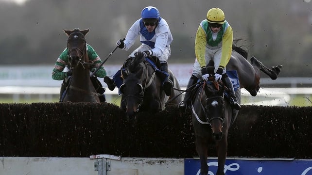 Bryan Cooper sits tight on Canaly (yellow) en route to victory at Fairyhouse