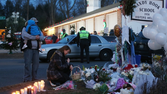 People have been paying their respects at a makeshift memorial near the scene of last week's shooting People have been paying their respects at a makeshift memorial near the scene of last week's shooting