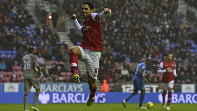 Mikel Arteta and Arsenal take on Bundesliga leaders Bayern Munich tonight