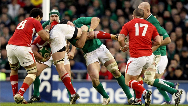 Ireland's Stephen Ferris tackles Ian Evans of Wales which led to a late penalty for Wales