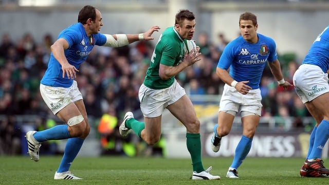 Ireland's Tommy Bowe with Sergio Parisse of Italy