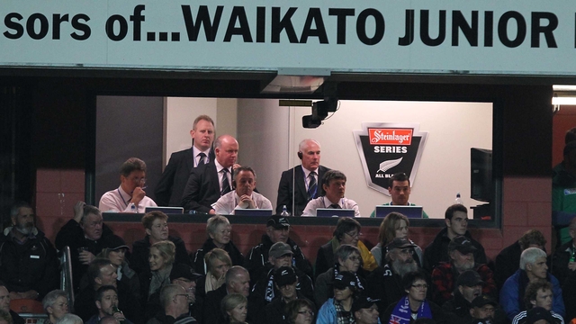 Ireland team management look on during the match