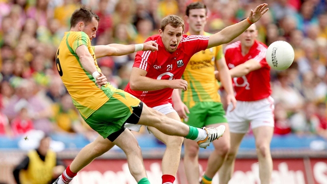 Karl Lacey fires a shot past Ciaran Sheehan of Cork