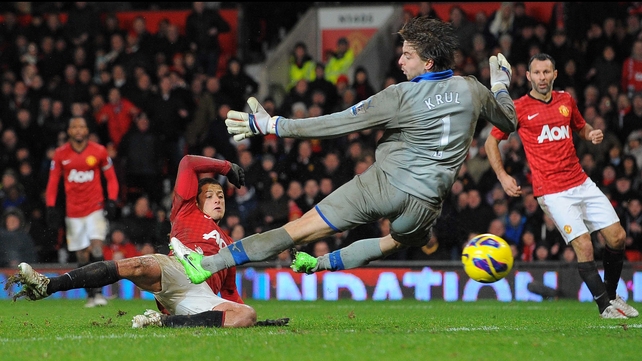 Manchester United's Javier Hernandez scores the winning goal past Tim Krul