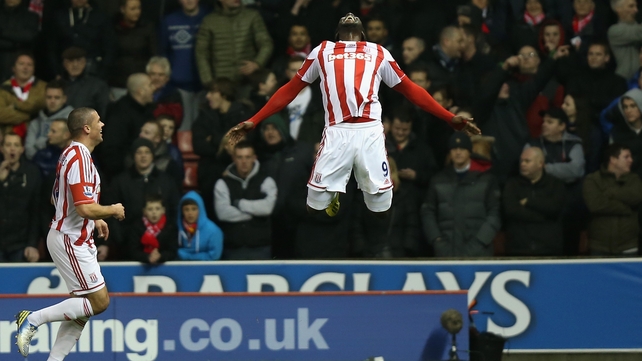 Kenwyne Jones celebrates his goal as fellow goalscorer Jon Walters looks on