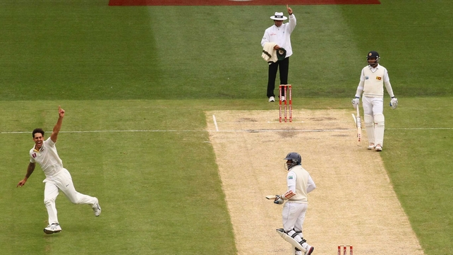 Mitchell Johnson celebrates after taking Tillakaratne Dilshan's wicket at the MCG