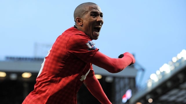 Ashley Young celebrates United's opener