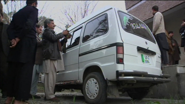 The workers' vehicle was targeted as they returned home from work at a children's community centre The workers' vehicle was targeted as they returned home from work at a children's community centre