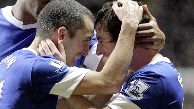 Leon Osman celebrates with goalscorer Leighton Baines as Everton proved their resolve with yet another come-from-behind win