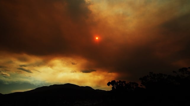 Clouds from a nearby bushfire are seen over Mount Wellington is Tasmania Clouds from a nearby bushfire are seen over Mount Wellington is Tasmania
