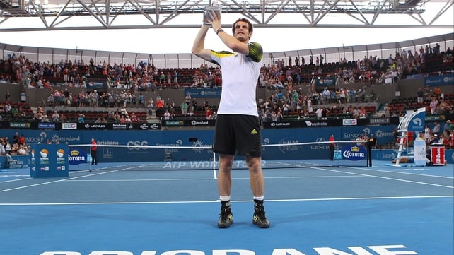 Andy Murray holds aloft the Brisbane International trophy for the second consecutive year