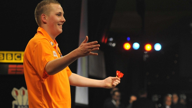 Martin Adams was knocked out 3-2 by Dutch prodigy Jimmy Hendriks
