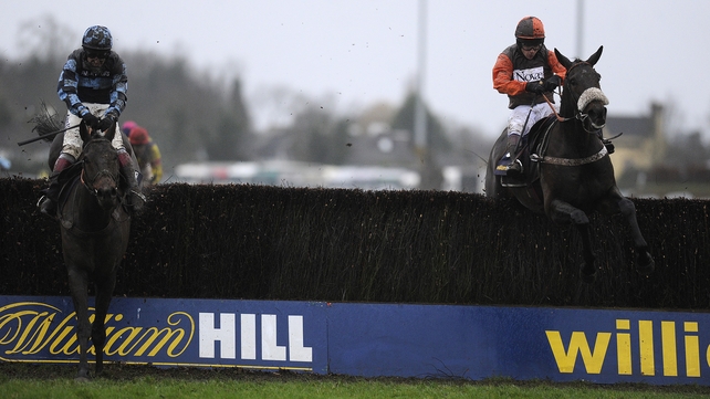 Long Run and Sam Waley-Cohen (r) clear the last en route to winning the King George last month