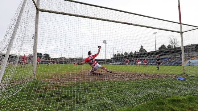 Tipperary's Barry Grogan scores from the penalty spot against Cork