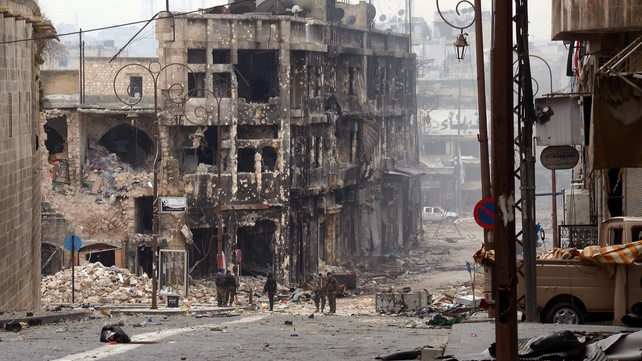 Syrian government troops take position in a heavily damaged area in the old city of Aleppo in northern Syria Syrian government troops take position in a heavily damaged area in the old city of Aleppo in northern Syria