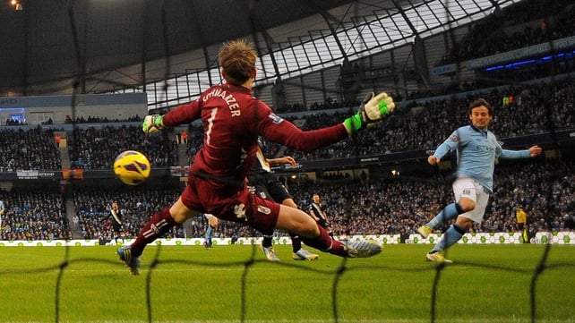 Manchester City's Spanish midfielder David Silva scored after two minutes