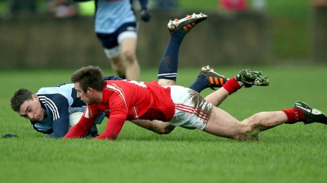 Paddy Andrews of Dublin and Louth's Liam Shevlin scramble for possession