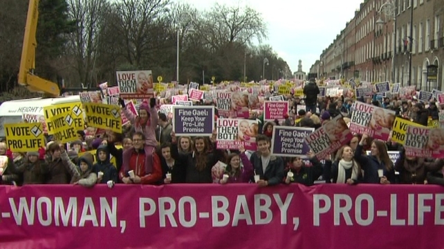 Thousands turned out in Dublin calling on Fine Gael not to renege on its election promise Thousands turned out in Dublin calling on Fine Gael not to renege on its election promise